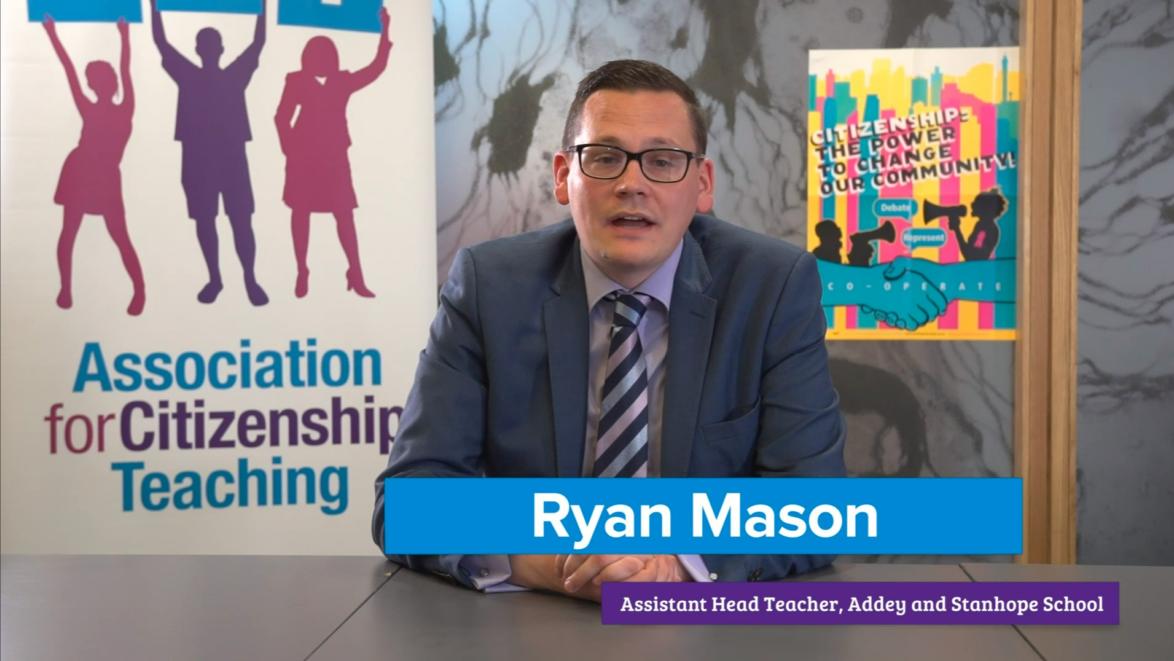 Ryan Mason, assistant head teacher of Addey and Stanhope School sitting at a desk